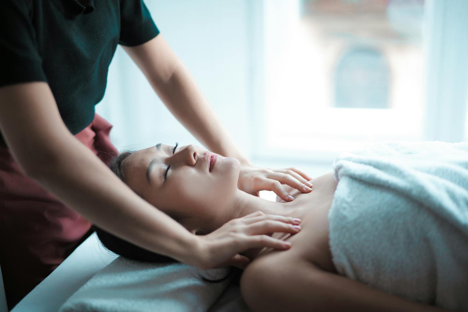 selective-focus-photo-of-woman-getting-a-massage-3764568-1536x1024